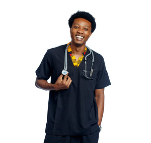 Person wearing a black medical scrub set with a stethoscope on a white background