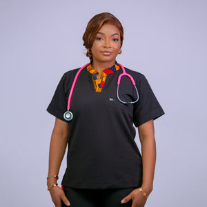 Person wearing a black scrub top with a pink stethoscope against a light purple background